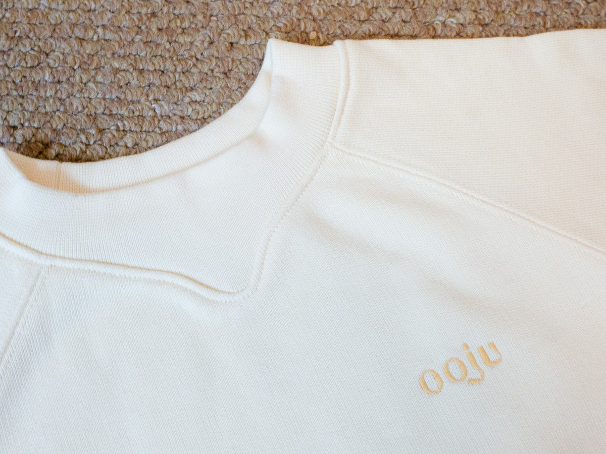 curved sweat shirts yellow logo detail